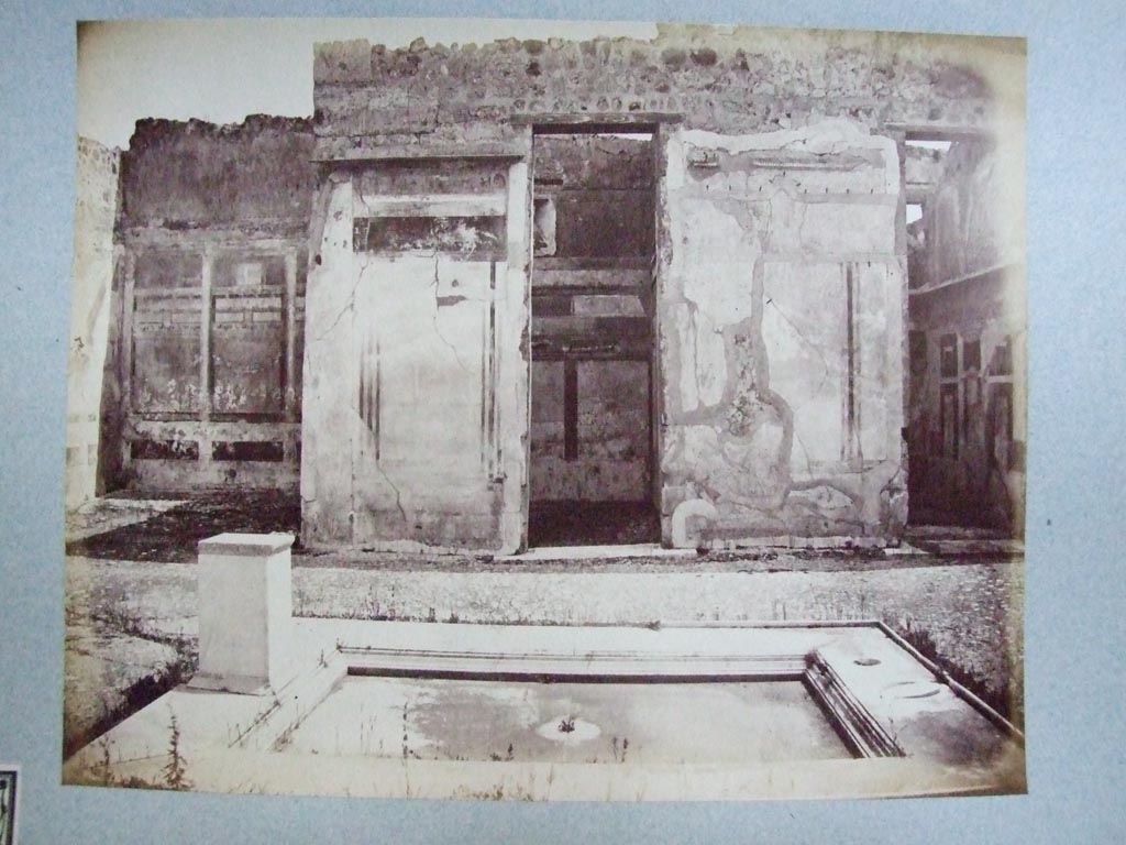 V.1.7 Pompeii. Looking east across atrium 4 towards rooms 9, 8 and 7 with painted decoration visible on walls.
Old undated photograph courtesy of the Society of Antiquaries, Fox Collection.