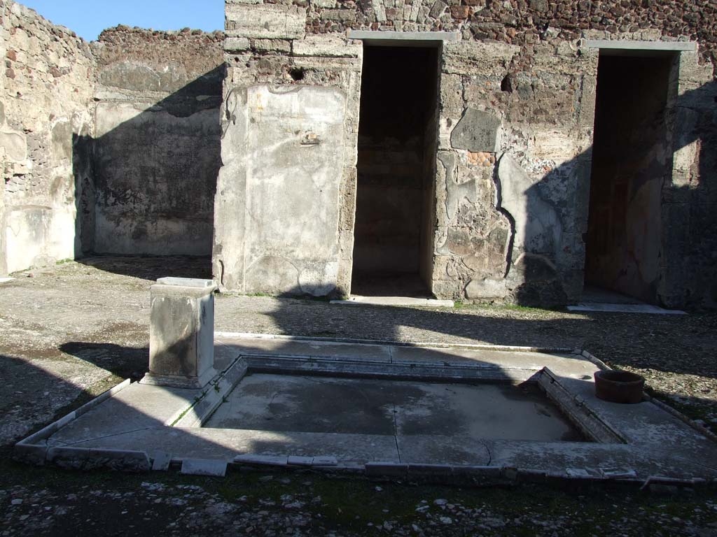 V.1.7 Pompeii. December 2007. Looking east across atrium 4 towards doorways to rooms 9,8 and 7.