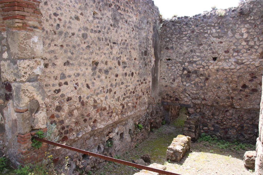 V.1.7 Pompeii. May 2024. Room “f”, looking towards south wall, and south-west corner. Photo courtesy of Klaus Heese.