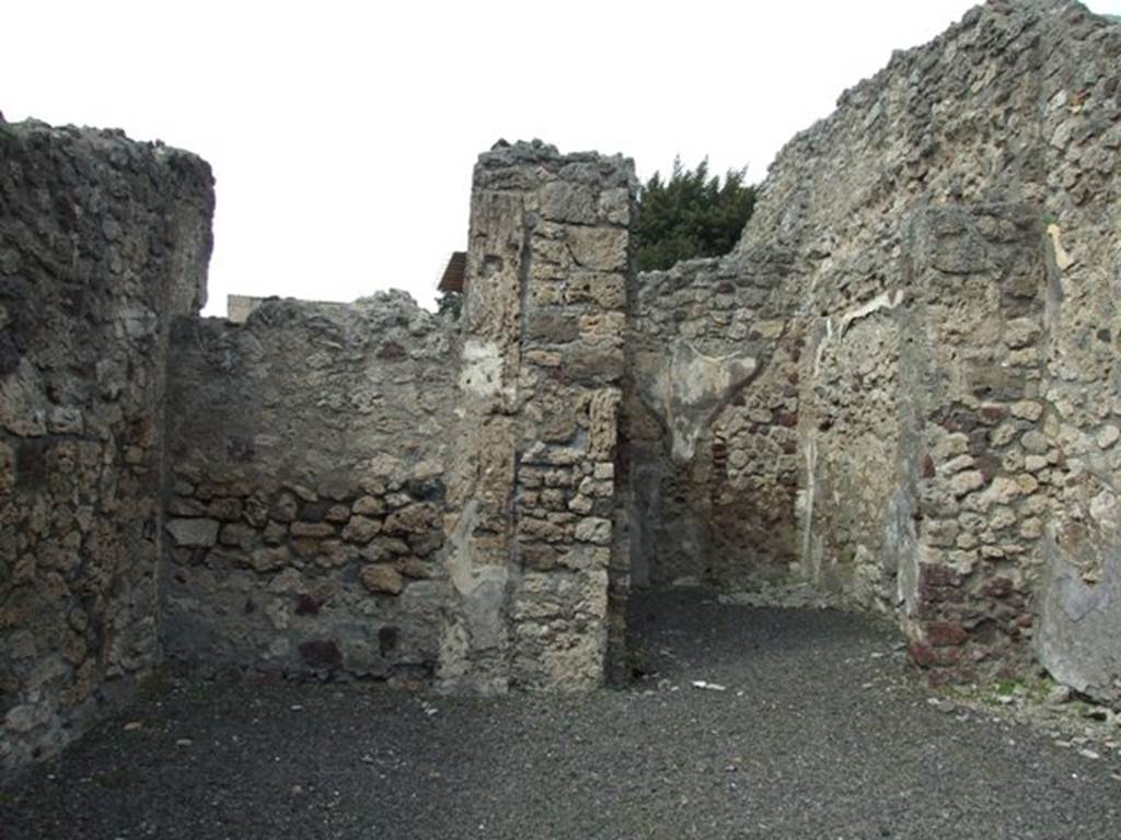 V.2.12 Pompeii.  March 2009.  North wall of shop, and rear room.