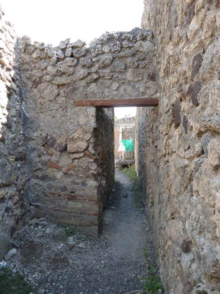 V.2.13 Pompeii. September 2015. Looking south from rear room towards corridor, and bar-room.