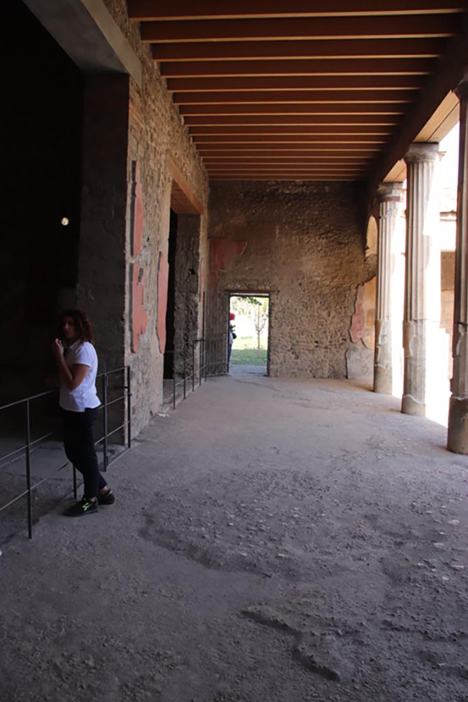 V.2.i Pompeii. October 2023. 
Looking east across north portico with doorway to tablinum, on left. Photo courtesy of Klaus Heese.
