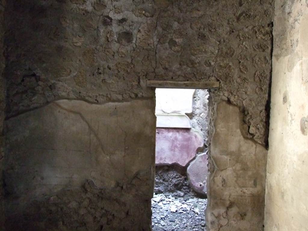 V.2.i Pompeii. March 2009.  Room 2b, South wall, with entrance to small recess or cupboard area under stairs in Room 2c.
