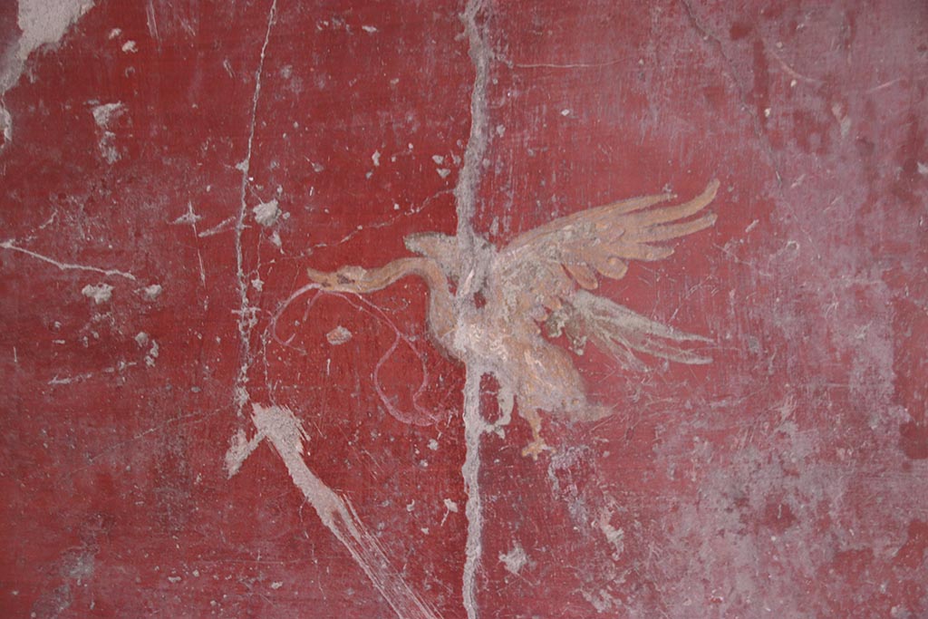 V.2.i Pompeii. October 2024. Corridor 10, east wall at south end, detail of painted bird. Photo courtesy of Klaus Heese.