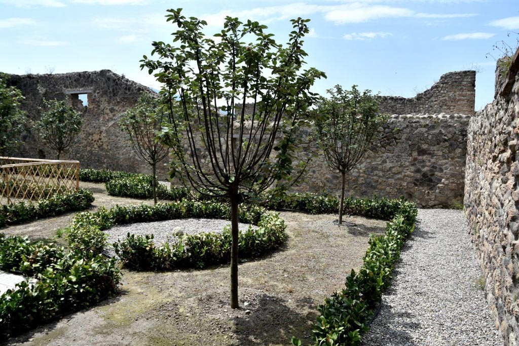 V.2.i Pompeii. July 2023. Room 12, garden area, looking south towards baths area with latrine on left.
It was possible to regenerate the three large green areas with the formation of three aesthetic and utilitarian gardens based on archaeological data and finds and on an interpretation of the proportions of the spaces of the domus as well as on the internal perspective visual axes.
È stato possibile rigenerare le tre ampie aree verdi con la formazione di tre giardini estetici ed utilitaristici basati sui dati e reperti archeologici e su un’interpretazione delle proporzioni degli spazi della domus oltre che sugli assi visuali prospettici interni.
Photograph © Parco Archeologico di Pompei.
See PAP: La casa delle Nozze d'Argento – Riapre 16 luglio 2023 a conclusione dei restauri

