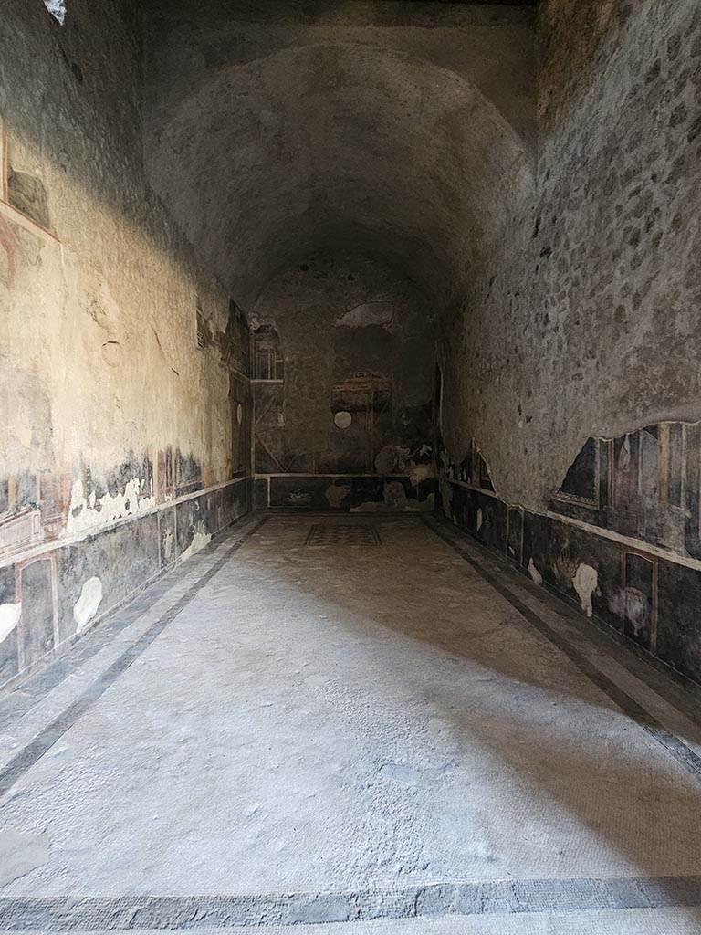 V.2.i Pompeii. November 2024. 
Room 17, looking west into oecus/triclinium from doorway from west portico. Photo courtesy of Annette Haug.
