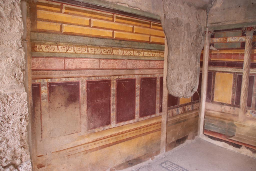 V.2.i Pompeii. October 2023. Room 18, looking south along east wall. Photo courtesy of Klaus Heese.