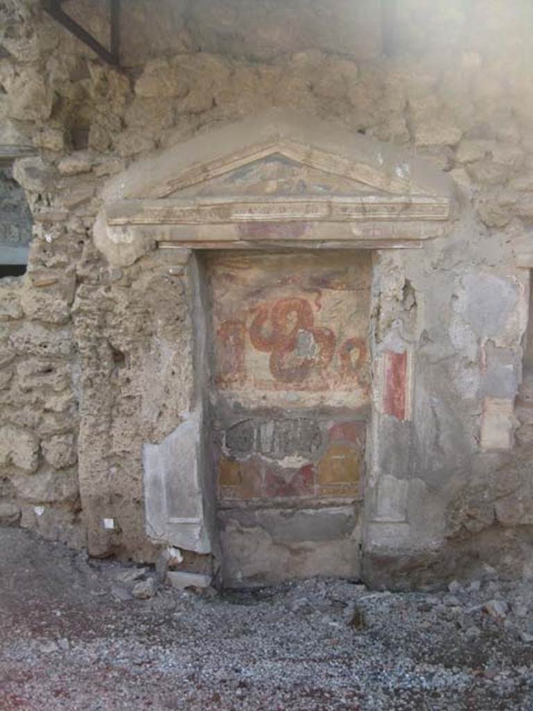 V.3.7 Pompeii. July 2012. West wall of garden area. Large aedicula lararium.
Photo courtesy of Sharon M. Wolf.