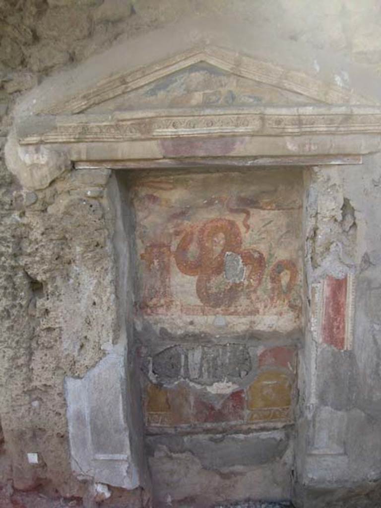 V.3.7 Pompeii. July 2012. West wall of garden area. Large aedicula lararium.
Photo courtesy of Sharon M. Wolf.