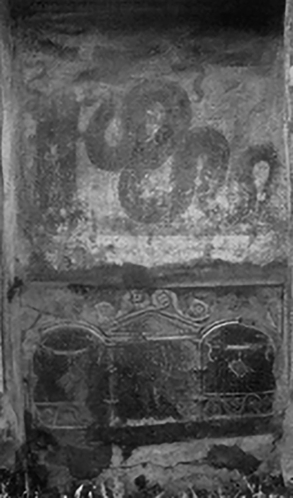 V.3.7 Pompeii. Pre-1937. Detail of interior of aedicule lararium and niche.
The lararium lower zone had red plaster with an aedicula façade within which stood the painted figure of Ceres.
She was wearing a crown of ears of grain and held a torch in her left hand and a sheaf of grain in her right.
Boyce contrasts the delicacy of this painting with the coarser and more familiar lararium art above.
See Boyce G. K., 1937. Corpus of the Lararia of Pompeii. Rome: MAAR 14. (112, p. 38, Pl 36, 2).