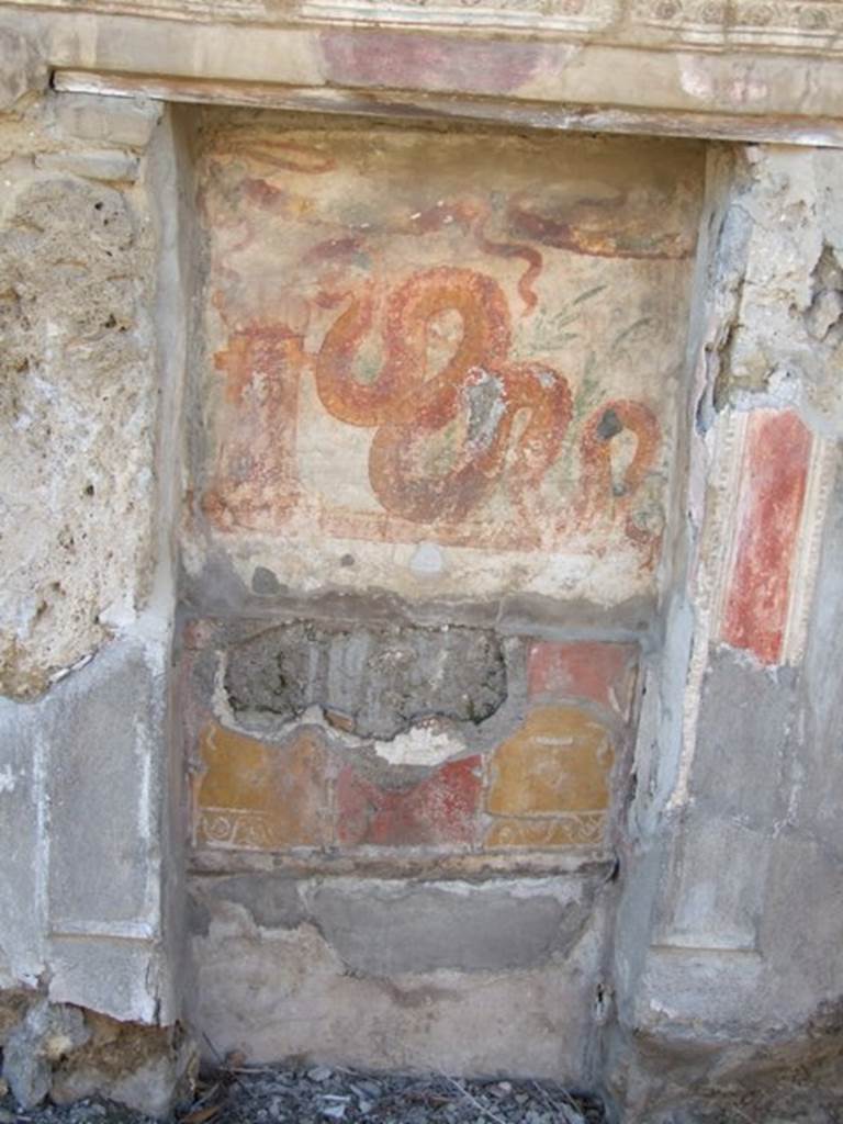 V.3.7 Pompeii. March 2009. West wall of garden area.Aedicula lararium. Niche with upper and lower zones. The marks can be seen of the partition that separated the upper and lower zones. Also visible are the marks of a second partition that apparently formed the floor of the niche. See Boyce G. K., 1937. Corpus of the Lararia of Pompeii. Rome: MAAR 14. (112, p. 38, Pl 36, 2).