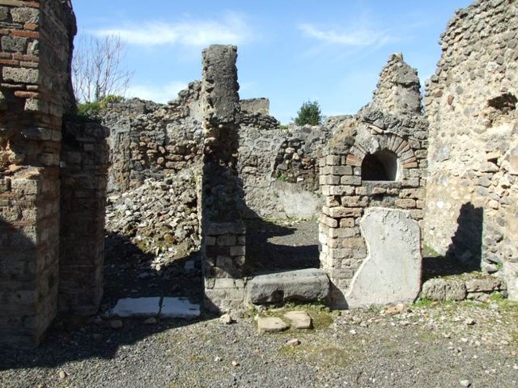 V.3.9 Pompeii. March 2009. North wall of atrium. 
Doorway to triclinium D, steps to upper floor, niche and doorway to a room B (still unexcavated in 1902). 
