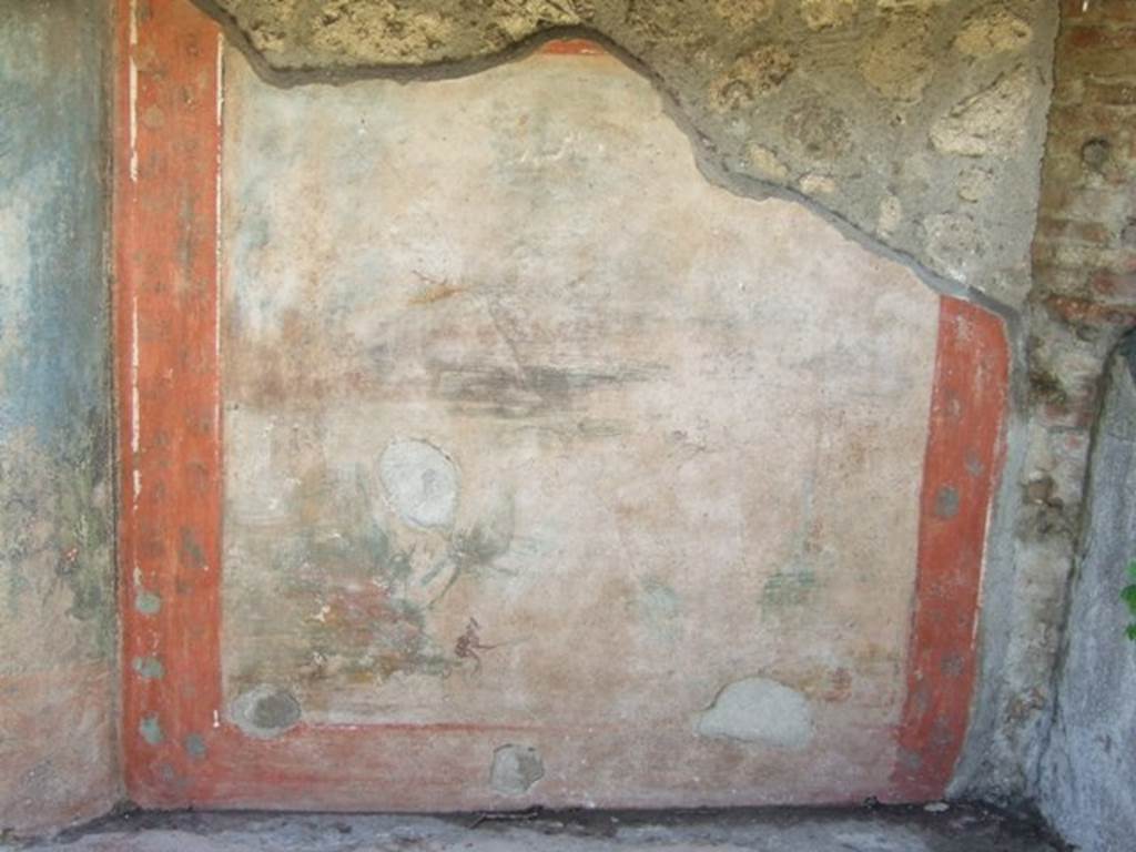 V.5.3 Pompeii. March 2009. Room 7, north-west corner on west side of peristyle. Painting 4 – Remains of landscape painting of Daedalus and Icarus. A small fisherman can be seen at the lower left of the painting, nothing much else remains.
