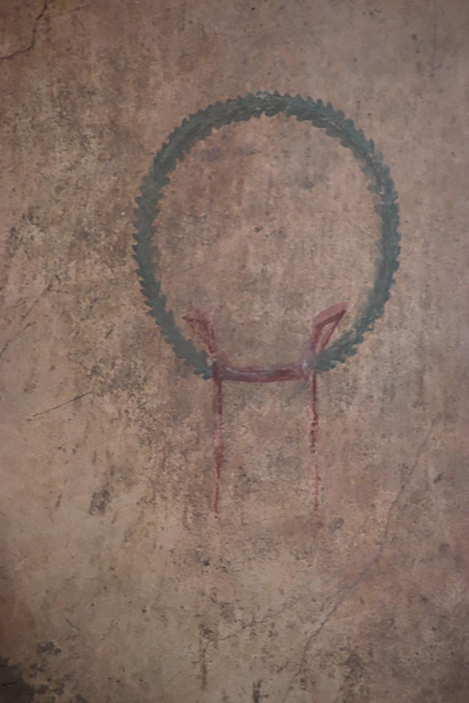 V.7.6 Pompeii. October 2023. Detail from east wall at north end. Photo courtesy of Klaus Heese. 