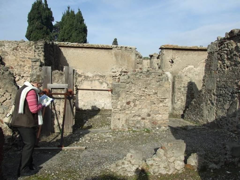 VI.1.7 Pompeii. December 2007. Looking north from room 36, into the doorway of room 37.