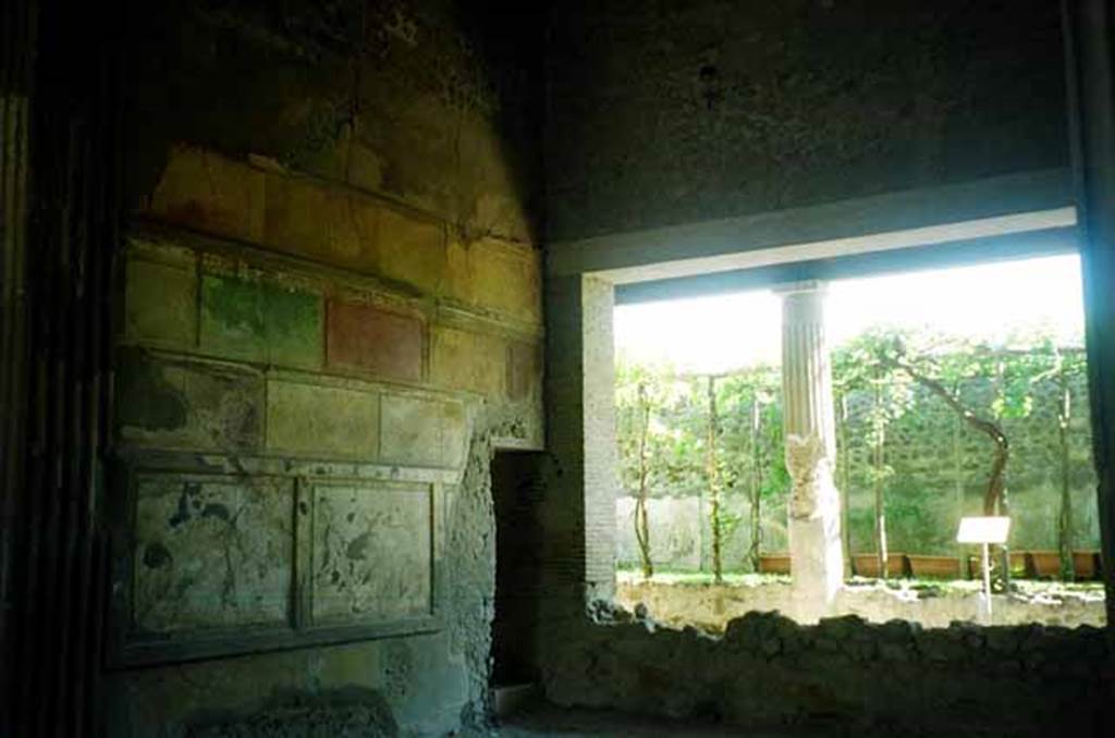 VI.2.4 Pompeii. June 2010. North-east corner of tablinum.  Photo courtesy of Rick Bauer.