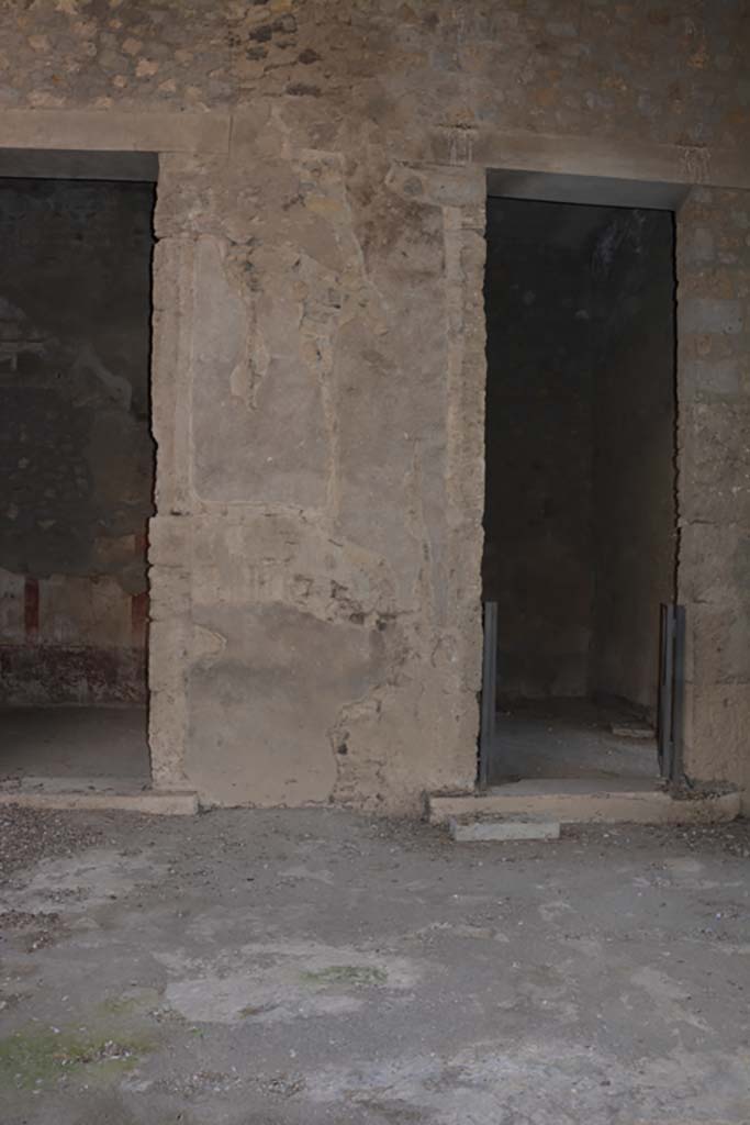 VI.2.4 Pompeii. March 2019. 
Looking towards south side of atrium towards pilaster between cubiculum, on left, and doorway to a room on east side of shop at VI.2.3.
Foto Annette Haug, ERC Grant 681269 D�COR.
