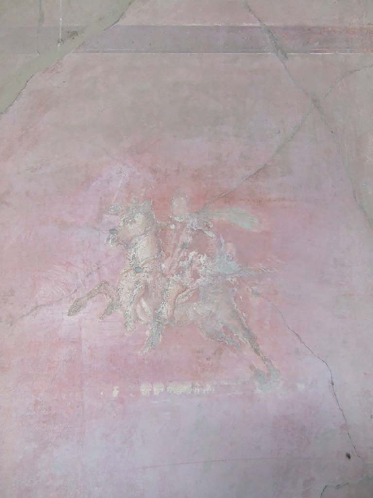 VI.2.14 Pompeii. September 2005. Painted figure on horseback from north wall of triclinium, at east end.