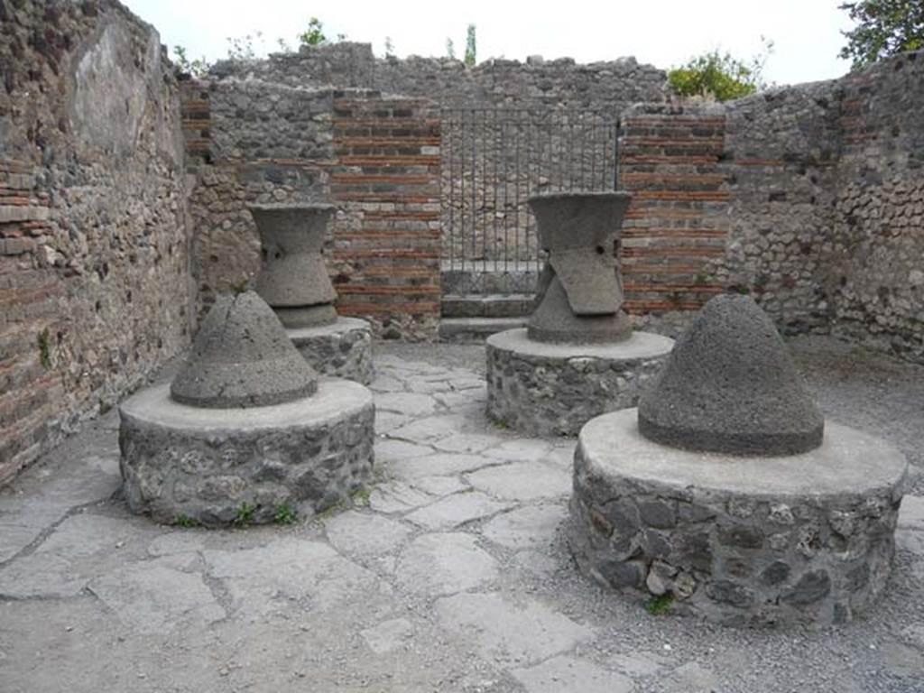 VI.3.3 Pompeii. May 2012. Room 7, looking east across mill-room towards entrance at VI.3.27. Photo courtesy of Buzz Ferebee.
