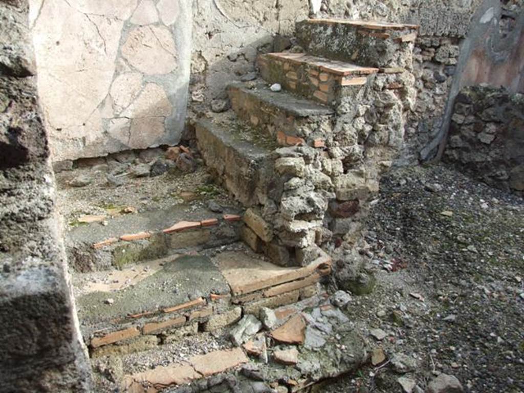 VI.5.3 Pompeii. December 2007. Room 7, steps in kitchen area.