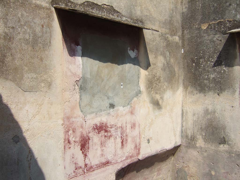 VI.7.3 Pompeii. September 2005. Room 4, north wall. Helbig identified two pictures in this room.
He said on the north wall, the painting was of Amphion and Zethus with a bull for sacrifice and has now been removed.
See Helbig, W., 1868. Wandgemälde der vom Vesuv verschütteten Städte Campaniens. Leipzig: Breitkopf und Härtel. (1389, 1411).
See Schefold, K., 1962. Vergessenes Pompeji. Bern: Francke. (photos T 55,2; 57,1)
See Bragantini, de Vos, Badoni, 1983. Pitture e Pavimenti di Pompei, Parte 2. Rome: ICCD. (p.147)