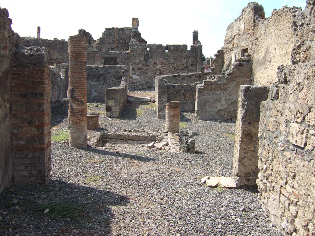VI.7.3 Pompeii. September 2005. Room 5, looking west across atrium to entrance, from tablinum.