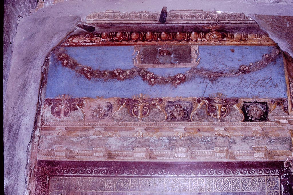 VI.7.18 Pompeii. 1966. East wall of second oecus to south of peristyle. 
Decoration from the top left-hand corner near the window. Photo by Stanley A. Jashemski.
Source: The Wilhelmina and Stanley A. Jashemski archive in the University of Maryland Library, Special Collections (See collection page) and made available under the Creative Commons Attribution-Non Commercial License v.4. See Licence and use details.
J66f0699
