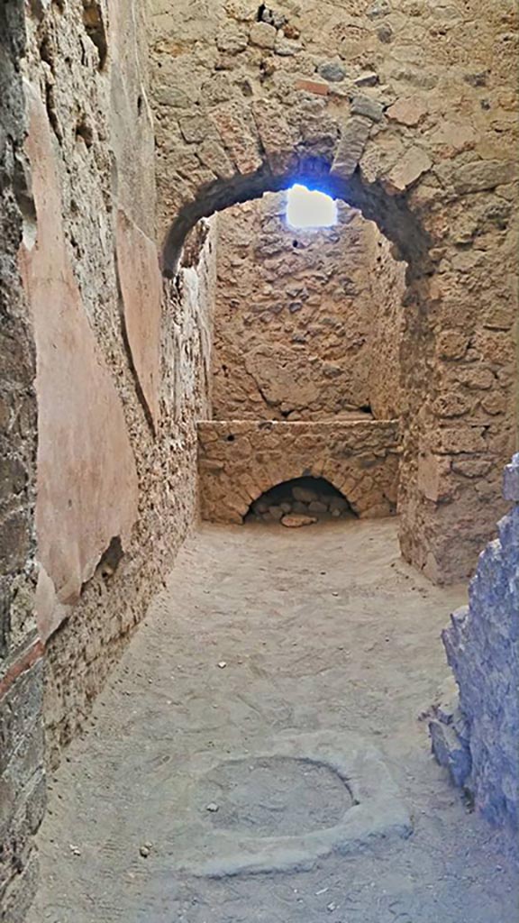 VI.8.3/5 Pompeii. 2015/2016. Room 13, kitchen. 
On the left, the imprint of the line of the stairs to the upper floor can be seen in the plaster.
Photo courtesy of Giuseppe Ciaramella.

