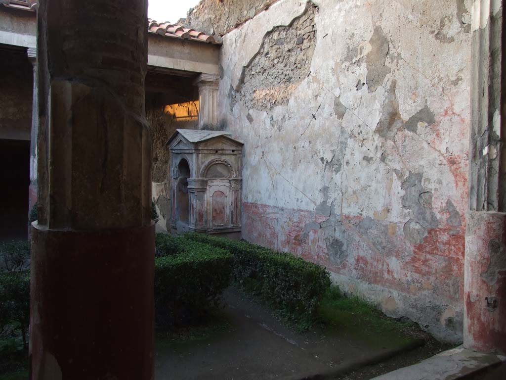 VI.8.3/5 Pompeii. December 2006. Peristyle with lararium against north wall.