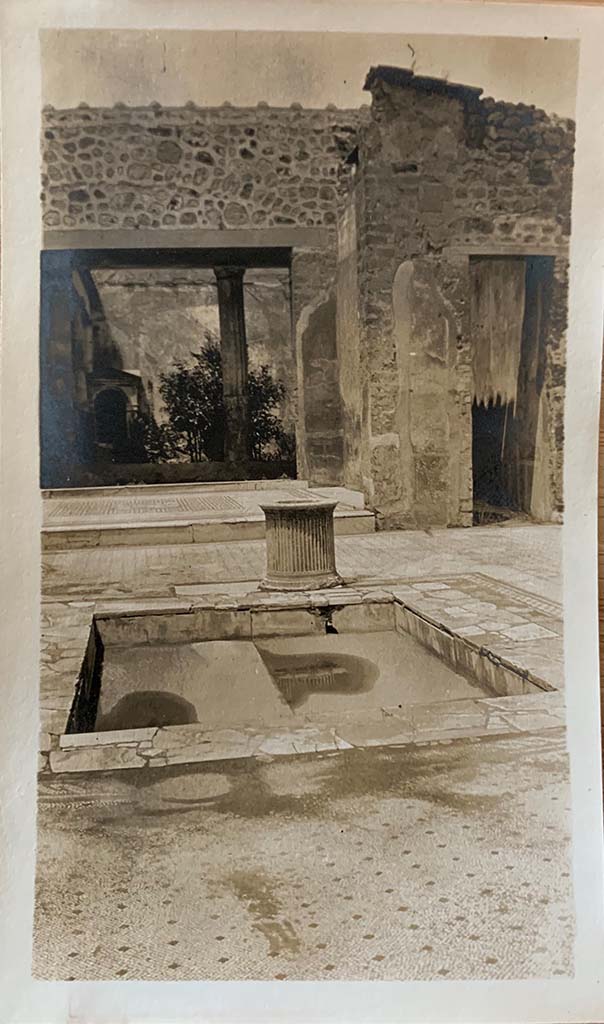 VI.8.5, Pompeii. 1907. 
Looking north across atrium flooring and impluvium towards tablinum and doorway to corridor, leading to rear.
Photo courtesy of Rick Bauer.

