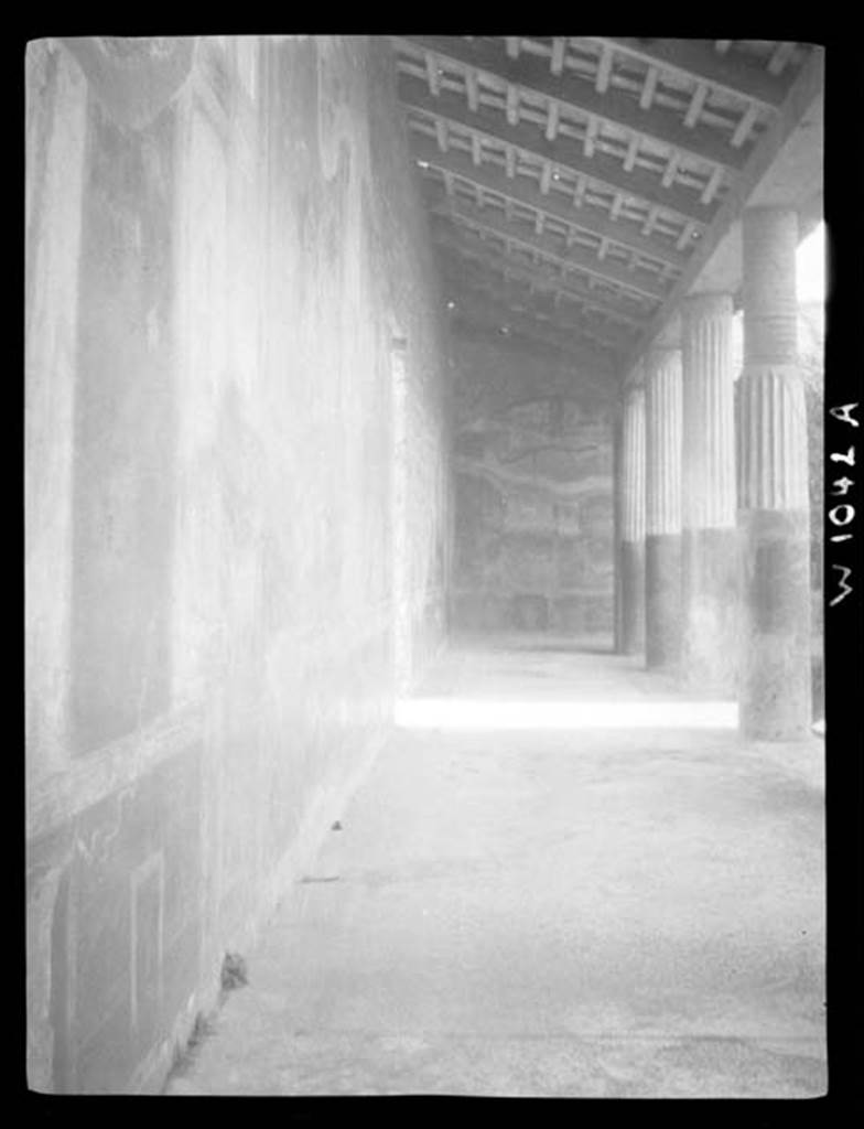 230403 Bestand-D-DAI-ROM-W.1042A.jpg
VI.9.6 Pompeii. W.1042. Room 6, looking west along south portico of peristyle towards west wall in south-west corner.
Photo by Tatiana Warscher. With kind permission of DAI Rome, whose copyright it remains.
See http://arachne.uni-koeln.de/item/marbilderbestand/230403