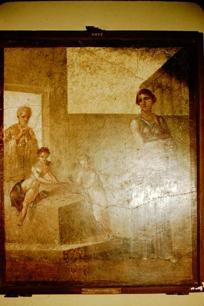 VI.9.6 Pompeii. 1957. Found 18th June 1828 in room 6, on the north pilaster at the east end of peristyle. Wall painting of Medea contemplating killing her children who are playing nearby. Now in Naples Archaeological Museum. Inventory number 8977.
Photo by Stanley A. Jashemski.
Source: The Wilhelmina and Stanley A. Jashemski archive in the University of Maryland Library, Special Collections (See collection page) and made available under the Creative Commons Attribution-Non Commercial License v.4. See Licence and use details. J57f0504