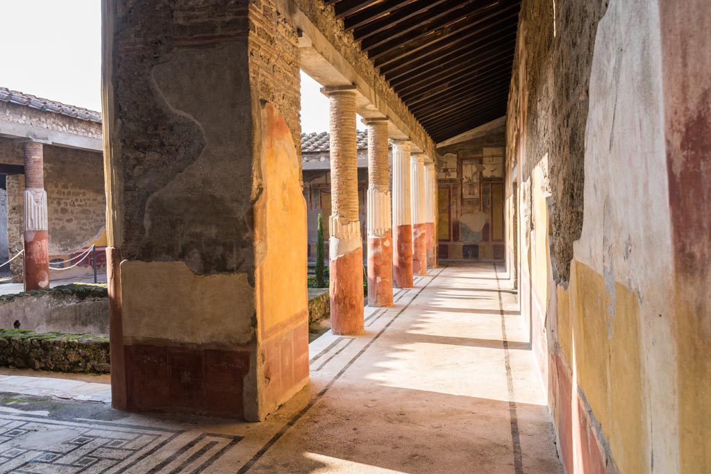 VI.9.6 Pompeii. January 2023. Room 6, looking west along north portico, from north-east corner. Photo courtesy of Johannes Eber.