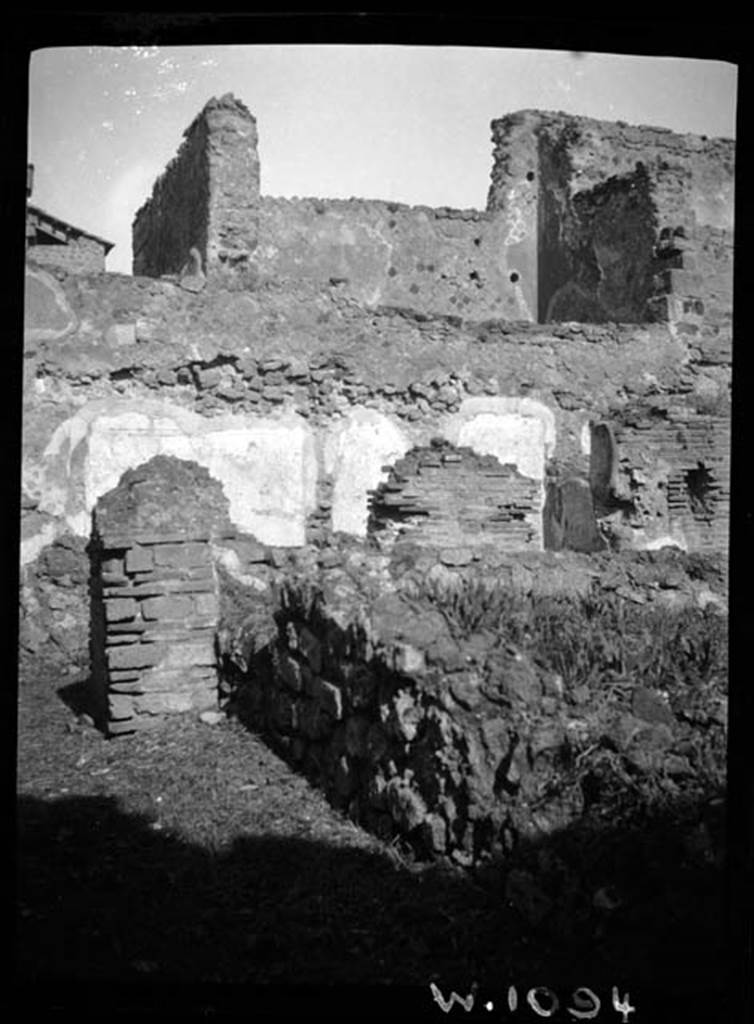 230428 Bestand-D-DAI-ROM-W.1094.jpg
VI.9.7 Pompeii. W1094. Pseudo-peristyle 13, looking north along west portico of garden.
In the background, the painted north walls of rooms 16 and 17 can be seen.
The upper level room above room 24 can be seen.
Photo by Tatiana Warscher. With kind permission of DAI Rome, whose copyright it remains.
See http://arachne.uni-koeln.de/item/marbilderbestand/230428