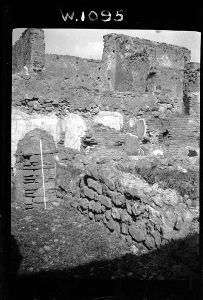 230586 Bestand-D-DAI-ROM-W.1095.jpg
VI.9.7 Pompeii. W1095. Looking north-east towards north portico of pseudo-peristyle 13.
In the background, the painted north walls of rooms 16 and 17 can be seen.
The upper level rooms above rooms 24 and 25 can also be seen.
Photo by Tatiana Warscher. With kind permission of DAI Rome, whose copyright it remains.
See http://arachne.uni-koeln.de/item/marbilderbestand/230586