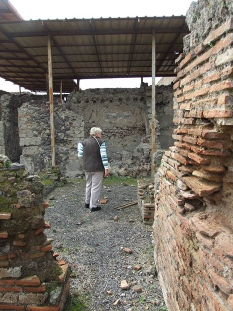VI.9.7 Pompeii. March 2009. Room 13. Garden. North passageway leading to room 14.