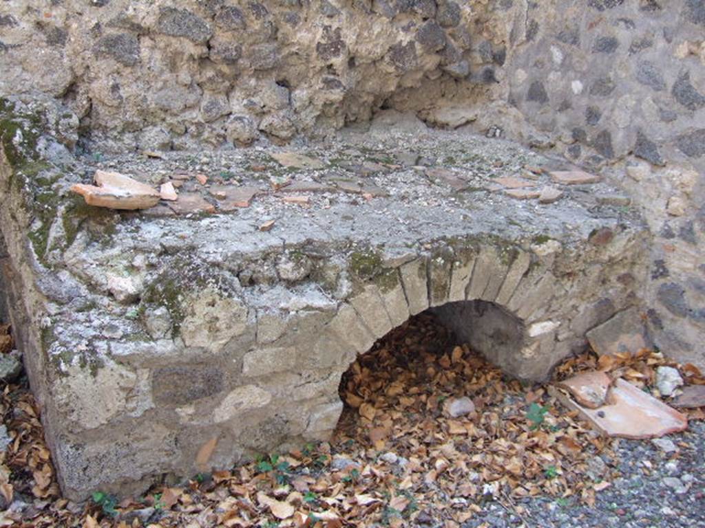VI.9.12 Pompeii. September 2005. Room 37, hearth in kitchen.