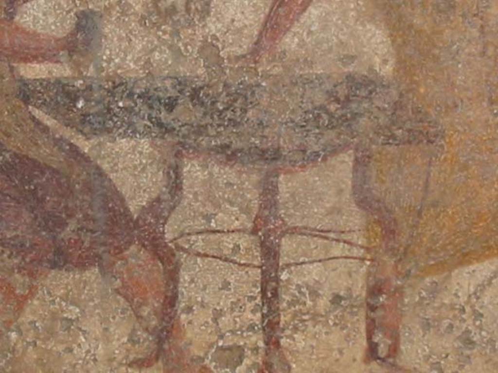 VI.10.1 Pompeii. May 2003. Detail of table from fresco near east end of south wall. 
Photo courtesy of Nicolas Monteix.
