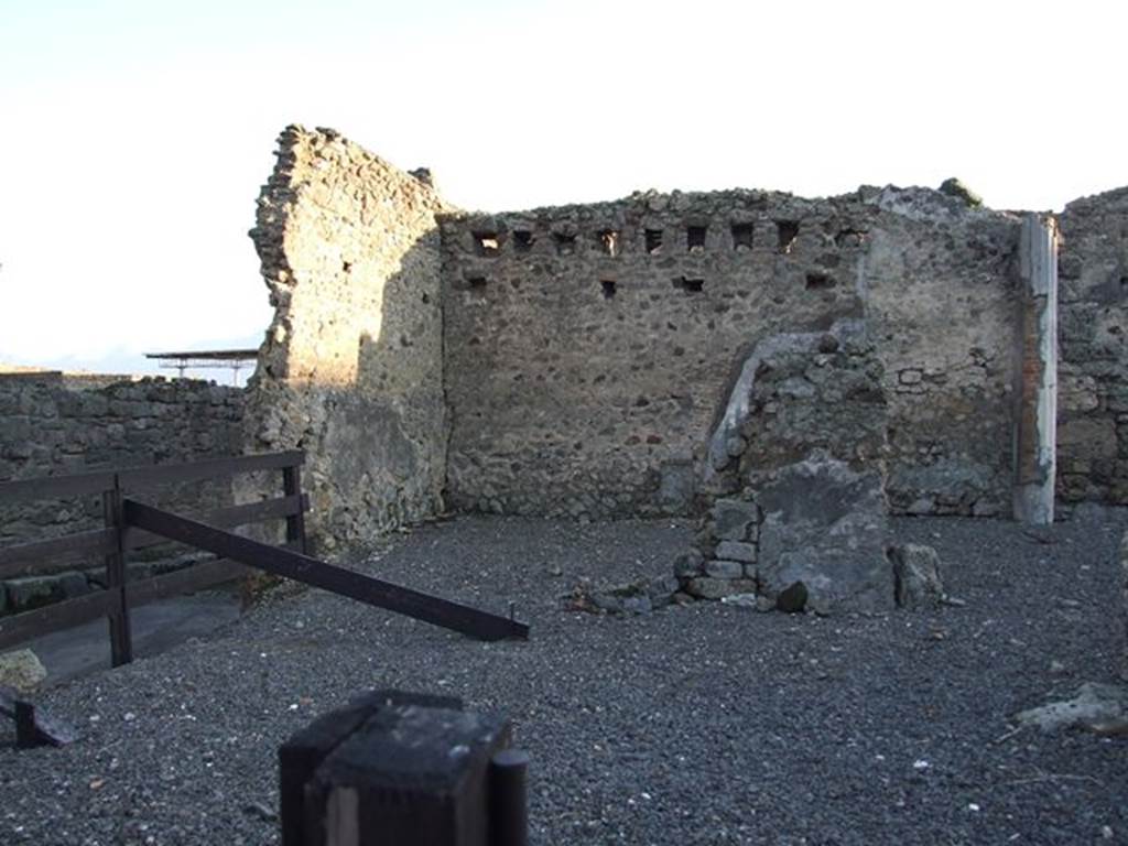 VI.10.2 Pompeii. December 2006. Looking towards site of triclinium in south-east corner. 
Looking south from Vicolo di Mercurio across area bombed in 1943. View showing total devastation of north-east sector of the house.
According to De Jorio �
�Questa casa fu scavata parte nel 1826 e tutta poi nel 1831.
In quest�ultima epoca si era disotterrato alle spalle del suo tablino un portico ed un piccolo viridario, donde per una scaletta si cala uscendo nell�opposto vicolo,e nel tempo stesso si discende ad una stanza sotterranea.�
(Trans: �This house was excavated in part in 1826 and then completely excavated in 1831.
In this last era a portico and a small garden had been unearthed behind the tablinum, where a staircase descended into the opposite vicolo, and at the same time descended to an underground room.")
See De Jorio A., 1836. Guida di Pompei. Napoli: Fibreno, (p.105).
