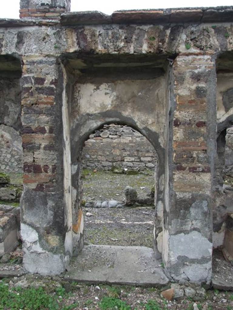VI.10.7 Pompeii. March 2009. Room 15, west side pf garden area with central doorway from garden to west corridor.
