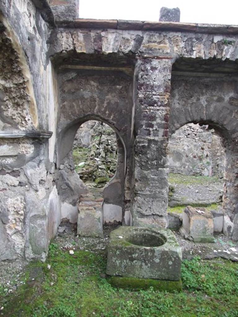 VI.10.7 Pompeii.  March 2009.  Room 15.  Garden area.  West side.  Arched recess 9 and cistern mouth at south end.