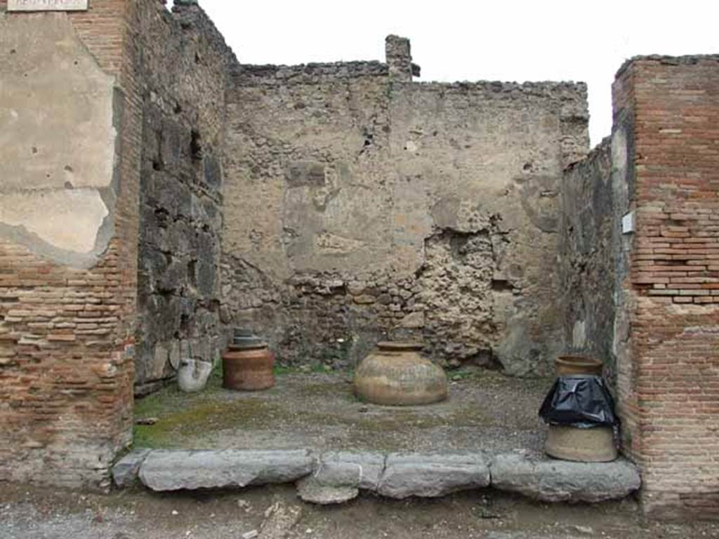 VI.10.10 Pompeii. May 2010. Looking north. According to Frohlich, found in the upper zone on the pilaster to the left was a painting of a male figure. In the lower zone on the left was a painting of a ship with rowers. A painting of a figure, possibly a Lar, was seen on the right pilaster, between VI.10.10 and VI.10.11. Below were two serpents flanking an altar. All the paintings have now faded and disappeared.
See Fr�hlich, T., 1991. Lararien und Fassadenbilder in den Vesuvst�dten. Mainz: von Zabern. (F40)
See Helbig, W., 1868. Wandgem�lde der vom Vesuv versch�tteten St�dte Campaniens. Leipzig: Breitkopf und H�rtel. (86 and 87)
