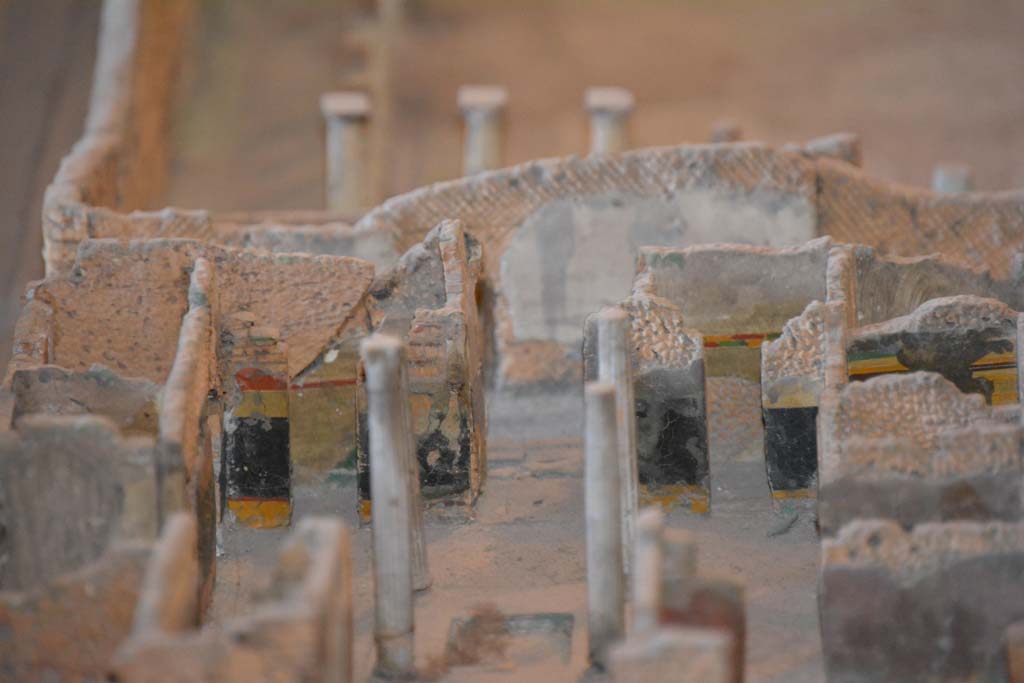 VI.11.9/10 Pompeii. July 2017. Looking south across atrium 27, towards entrance doorway, in centre.
On the left of it in the black painted atrium wall is the doorway to room 25, on the right into room 24.
From cork model in Naples Archaeological Museum.
Foto Annette Haug, ERC Grant 681269 D�COR.

