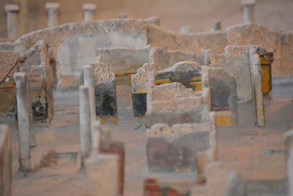 VI.11.9/10 Pompeii. July 2017. Looking south across atrium 27, towards entrance doorway, on left.
Continuing to the right in the black painted atrium wall is the doorway to room 24.
Next to that, the yellow wall would be the south wall of room 28, on its right is the south-east corner of atrium 3, (VI.11.9) also with black wall and yellow zoccolo. On the extreme right is the entrance corridor of VI.11.9.
From cork model in Naples Archaeological Museum.
Foto Annette Haug, ERC Grant 681269 D�COR.
