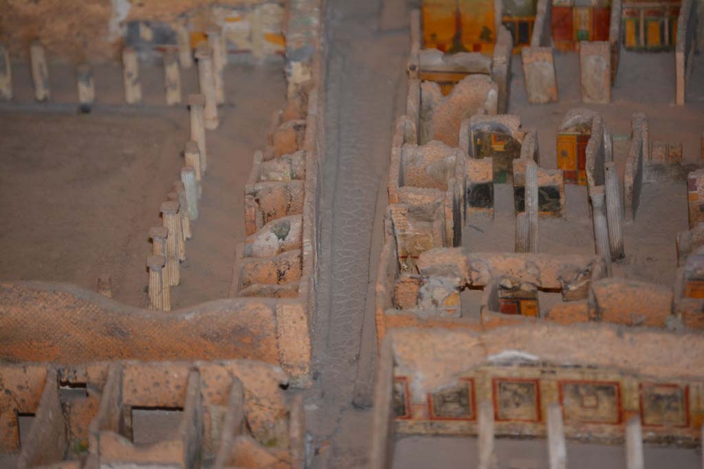 VI.11.9/10 Pompeii. July 2017. 
On the right, across the centre, rooms on the west side of atrium 27 features the black painted room 28, the yellow/red painted room 29, undecorated corridor 48, and room 31, west ala.
From cork model in Naples Archaeological Museum.
Foto Annette Haug, ERC Grant 681269 D�COR.
