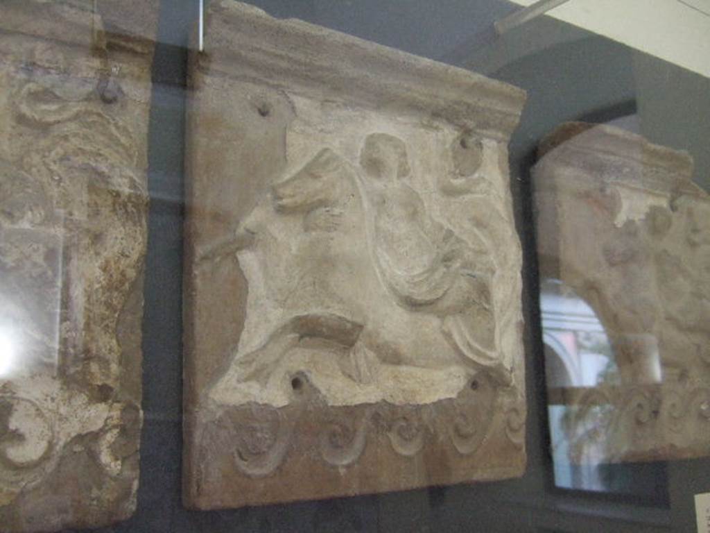 VI.12.2 Pompeii. Terracotta facing with Nereid on a sea horse. Found in first peristyle.  Now in Naples Archaeological Museum.  Inventory number 21516.