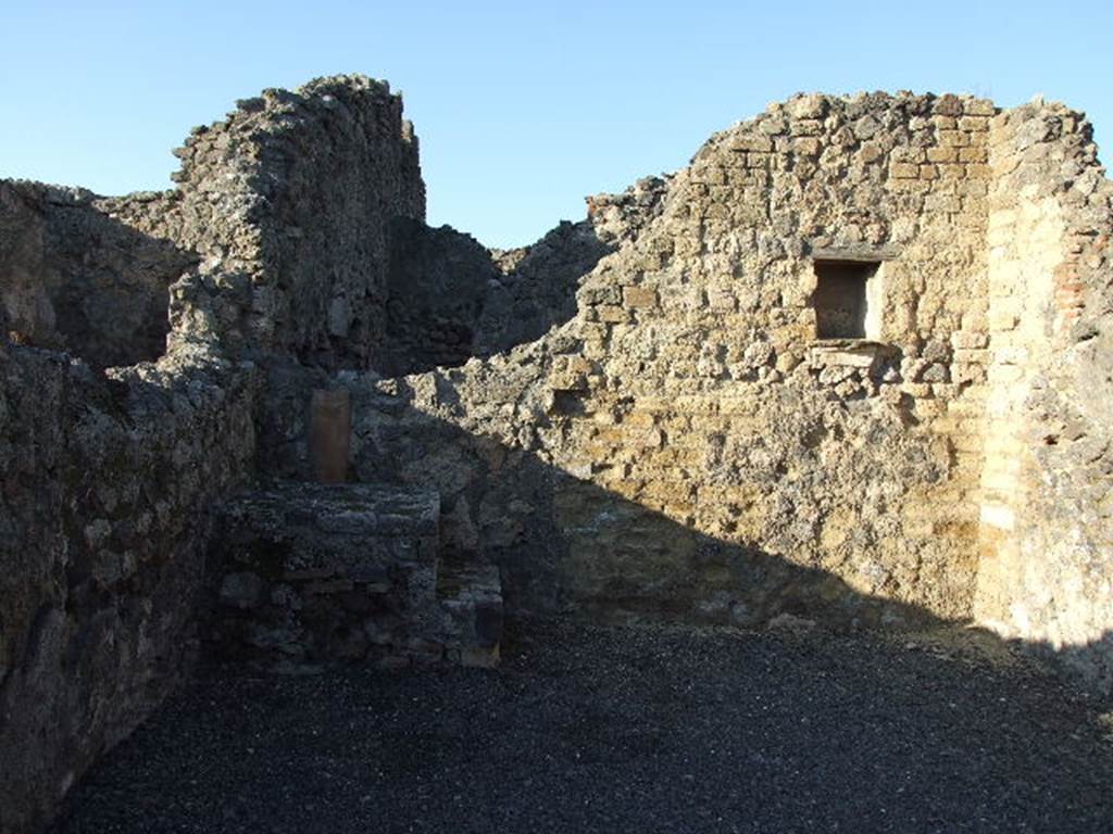 VI.14.4 Pompeii. December 2006. North wall of shop.