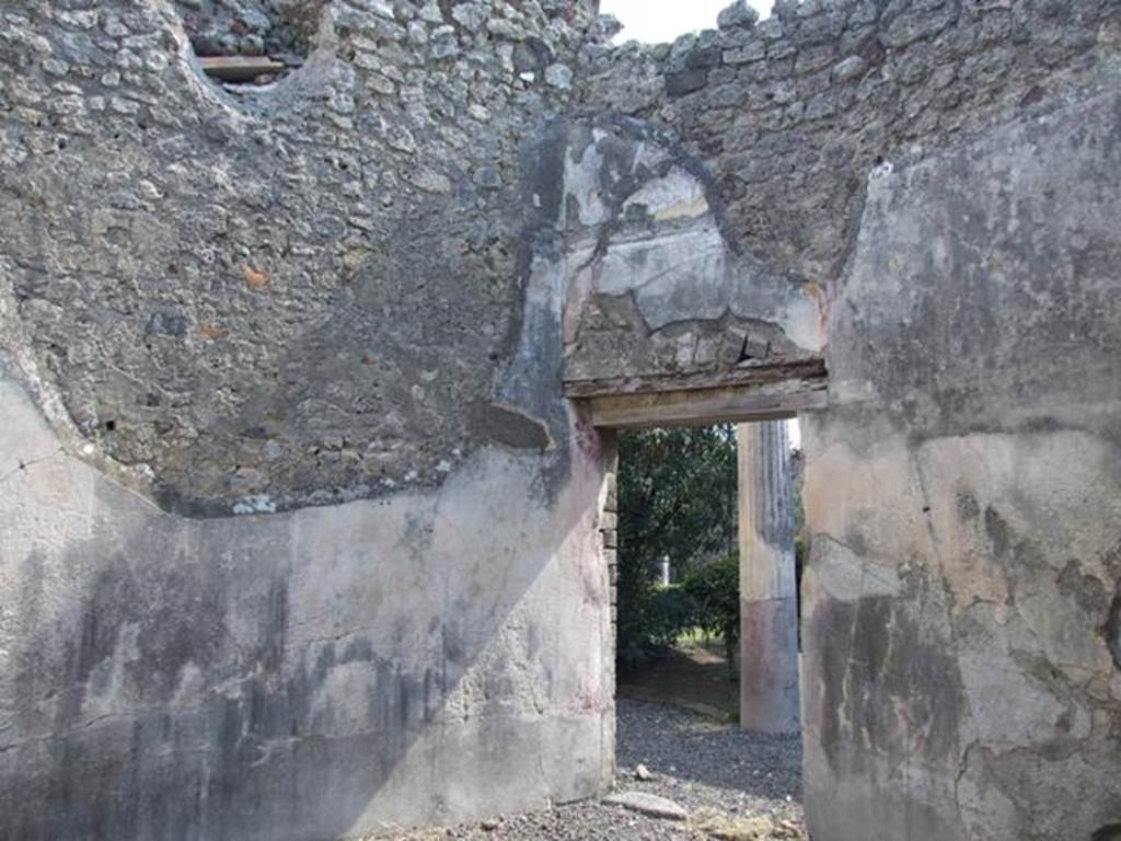 VI.14.20 Pompeii. March 2009. Room 17. South east corner with door to portico area.