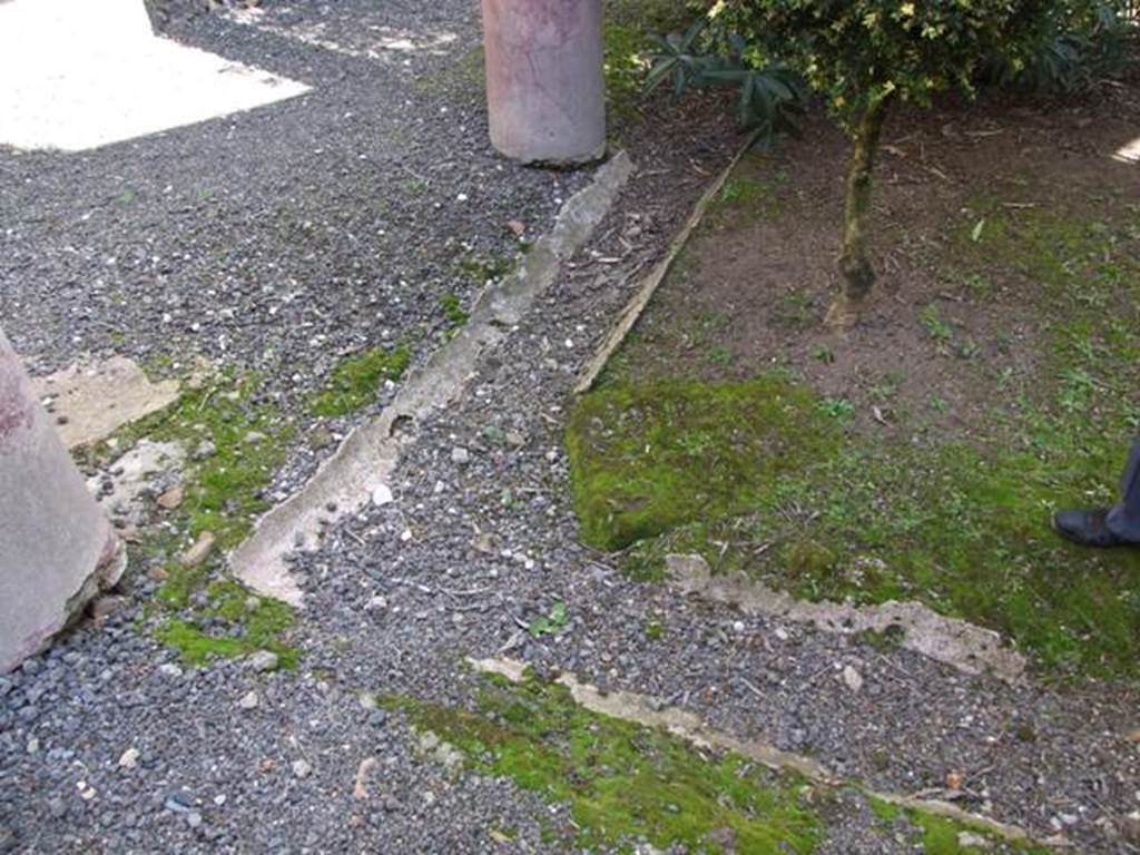 VI.14.20 Pompeii. March 2009. Room 18, gutter in north-west corner of garden area.