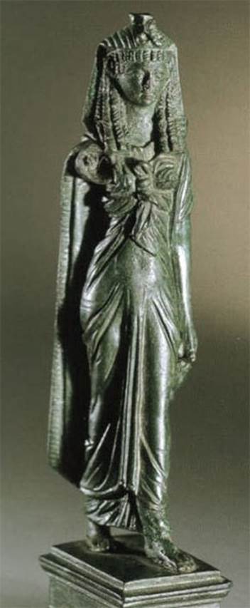 VI.14.27 Pompeii. Found in room �b�. 
Bronze statuette of Isis.  
Now in Naples Archaeological Museum. Inventory number 110605?

